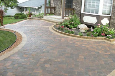 This is an example of a large full sun stone landscaping in Minneapolis.
