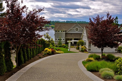 This is an example of a front yard concrete paver driveway in Seattle.