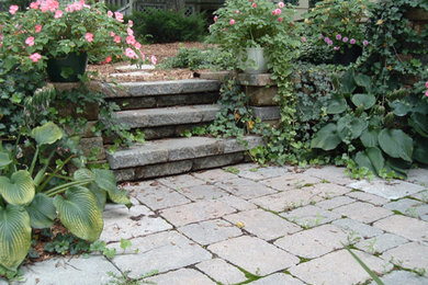 This is an example of a traditional backyard stone landscaping in Kansas City.