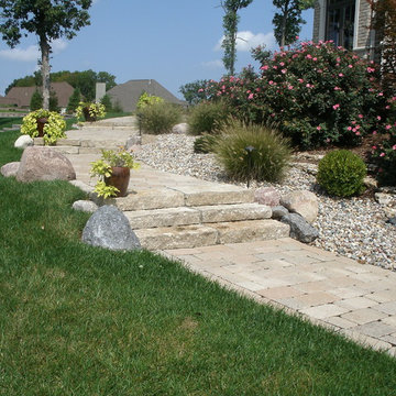 Paver walkway with natural limestone steps