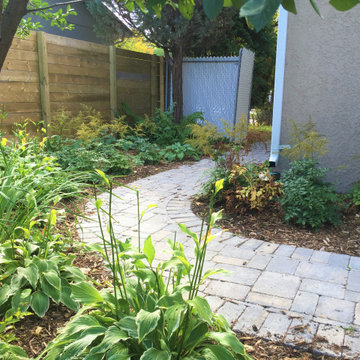 Paver walkway with perennial beds