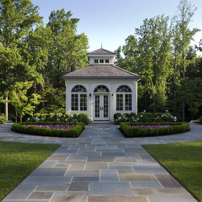 This is an example of a traditional backyard stone landscaping in New York.