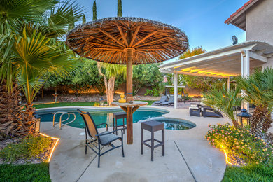 This is an example of a mid-sized modern backyard landscaping in Las Vegas.