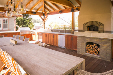 Inspiration for a mid-sized craftsman drought-tolerant and full sun backyard concrete paver landscaping in San Francisco with a fire pit for fall.