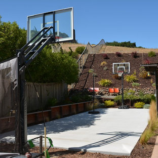 This is an example of a large mediterranean full sun backyard concrete paver landscaping in San Francisco.