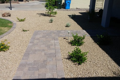 Small traditional front garden in Phoenix with a garden path and concrete paving.