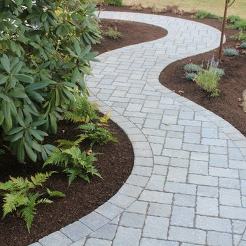 Planting & Techo-Bloc serpentine walkway Designed & Built by Garden Artisans.