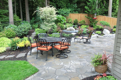 Inspiration for a rustic patio remodel in Seattle