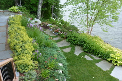 Design ideas for a mid-sized traditional partial sun backyard concrete paver landscaping in Boston for summer.