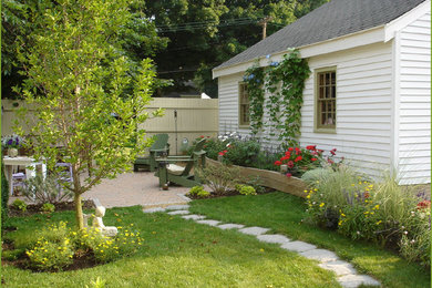 Design ideas for a small traditional partial sun backyard concrete paver landscaping in Boston for summer.