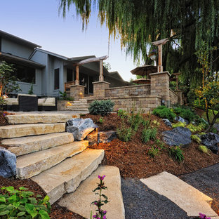 This is an example of a large rustic hillside stone landscaping in Milwaukee.