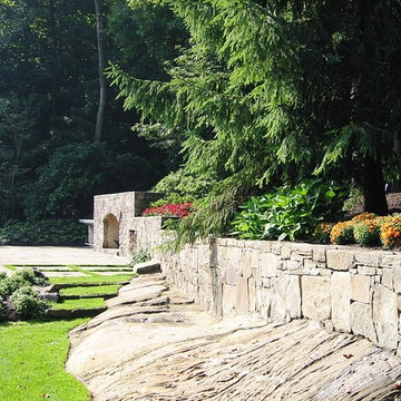 Pool Stone Hearth and Surrounding Gardens