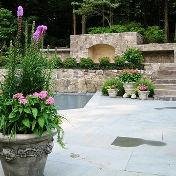 Pool Stone Hearth and Surrounding Gardens
