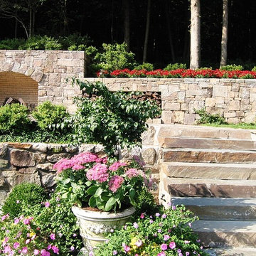 Pool Stone Hearth and Surrounding Gardens