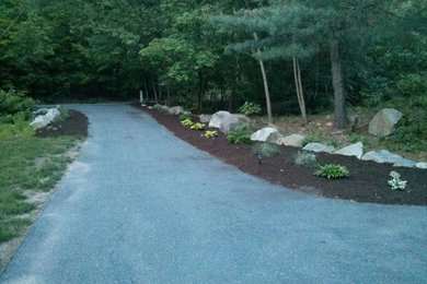 Photo of a front yard mulch driveway in Boston.