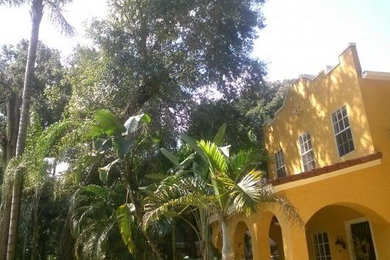 Design ideas for a medium sized world-inspired back fully shaded garden for summer in Orlando.