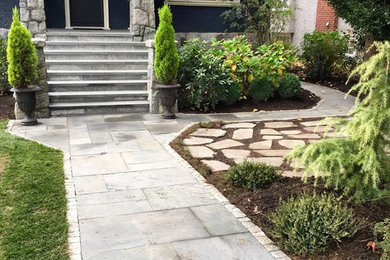Design ideas for a stone landscaping in Vancouver.