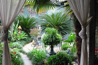 Inspiration for a tropical landscaping in New Orleans.