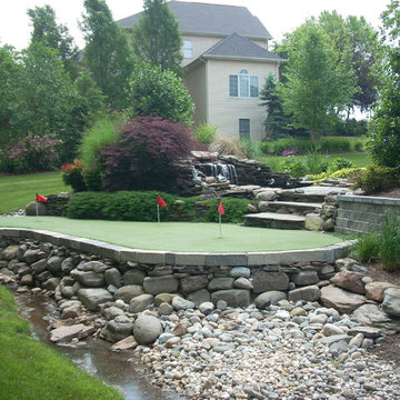 Putting Green with Stone Wall and Custom Drainage