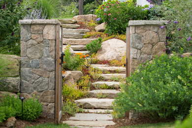 Design ideas for a traditional full sun backyard stone garden path in Bridgeport for summer.