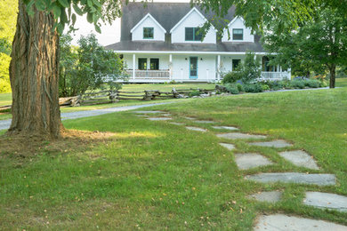 This is an example of a farmhouse landscaping in New York.