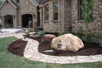 Design ideas for a mid-sized traditional drought-tolerant front yard stone garden path in Salt Lake City.