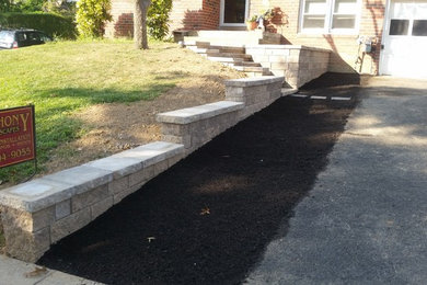 This is an example of a traditional concrete paver retaining wall landscape in Philadelphia.