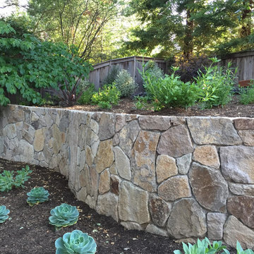 Retaining wall helps visually break up landscaping