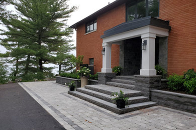 Revised Front entry porch_stone steps_retaining wall planters_interlock walkway