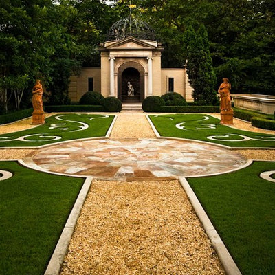 This is an example of a huge mediterranean courtyard formal garden in Nashville.