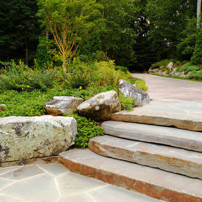 Inspiration for a transitional hillside stone landscaping in DC Metro.