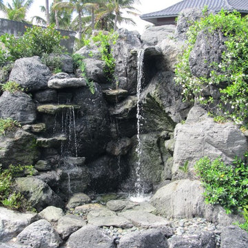 Rock waterfall and pond in Manalapan, Florida