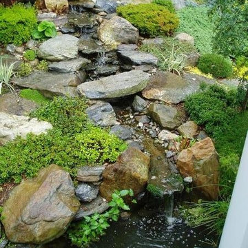 Rock Waterfall garden and pond in Connecticut