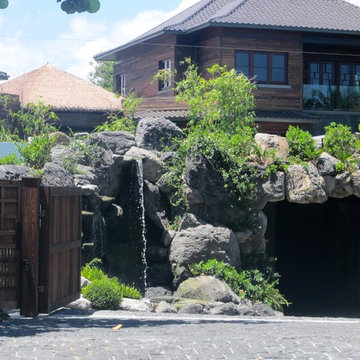Rock waterfall house