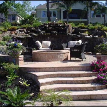 Rock waterfall, pond, patio and fire pit