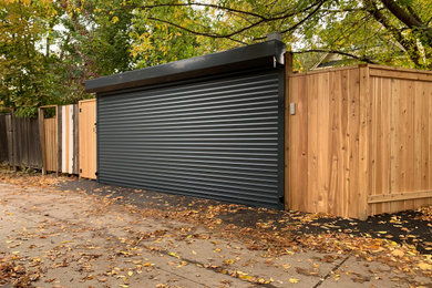 This is an example of a mid-sized modern backyard wood fence landscaping.