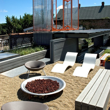 Roof lounge includes gas fire ring and "beach" of course sand.