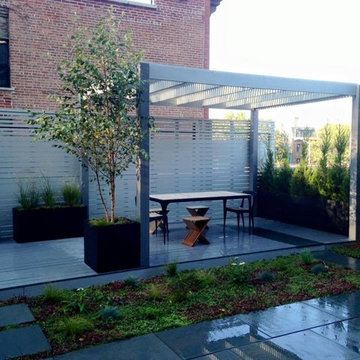 Rooftop garden with green roof, dining table