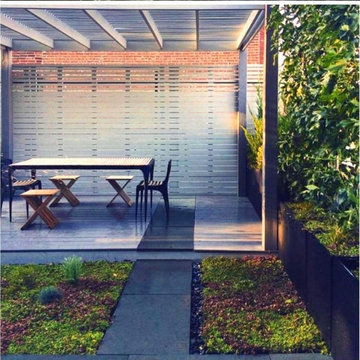 Rooftop pergola dining area and green roof