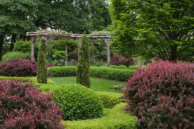Rustic Arbor and Boxwood Topiary