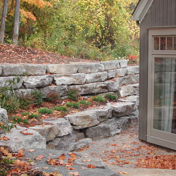 Rustic two tiered armour stone retaining