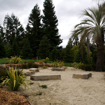 Sand play and fire pit area