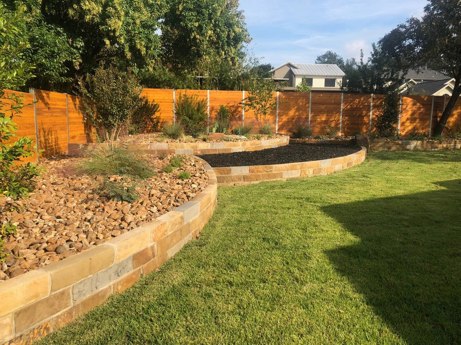 Sandstone tiered beds w/ Colorado River Rock & Mulch, New Palisades Zoysia Sod