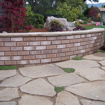 Saratoga 2, soft set flagstone patio and brick wall