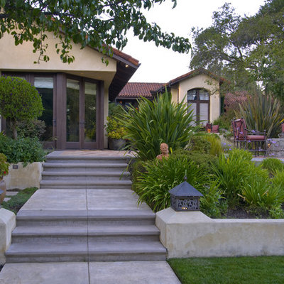This is an example of a mediterranean hillside landscaping in San Francisco with a fire pit.