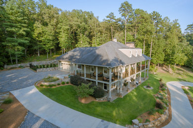 Inspiration for a large eclectic hillside concrete paver landscaping in Atlanta.