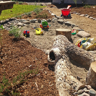 Inspiration for a mid-sized mediterranean drought-tolerant and full sun backyard gravel outdoor playset in San Diego.