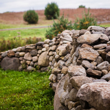 Sculptural Stone Fence and Moongate