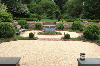 Design ideas for a mid-sized traditional backyard gravel formal garden in DC Metro.