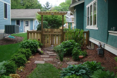 This is an example of a large eclectic backyard landscaping in Other.